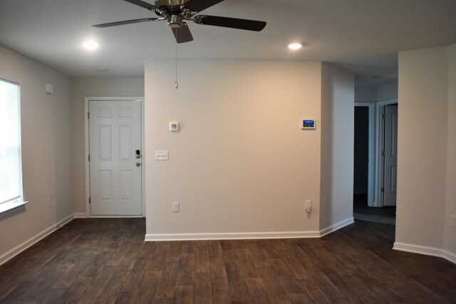 575 Earl Godwin Rd, Freeport, FL 32439 - spare room with dark wood-style floors, ceiling fan, baseboards, and recessed lighting