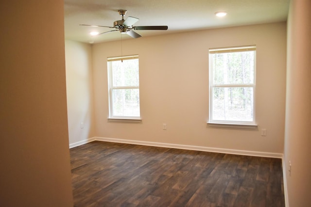 575 Earl Godwin Rd, Freeport, FL 32439 - unfurnished room with healthy amount of natural light, dark wood-style floors, ceiling fan, baseboards, and recessed lighting
