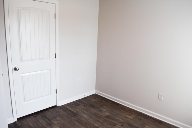 575 Earl Godwin Rd, Freeport, FL 32439 - spare room featuring dark wood-style floors and baseboards