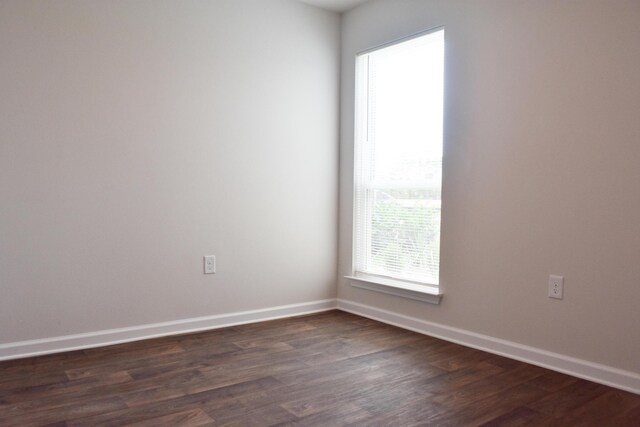 575 Earl Godwin Rd, Freeport, FL 32439 - spare room featuring dark wood finished floors and baseboards