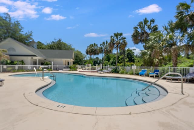 4274 Calinda Ln Unit 215, Niceville, FL 32578 - community pool featuring fence and a patio