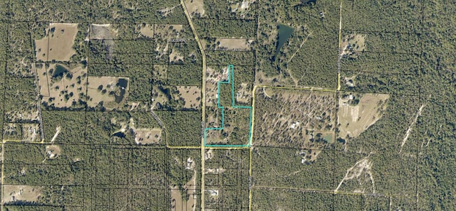 aerial overview of property's location with property parcel outlined