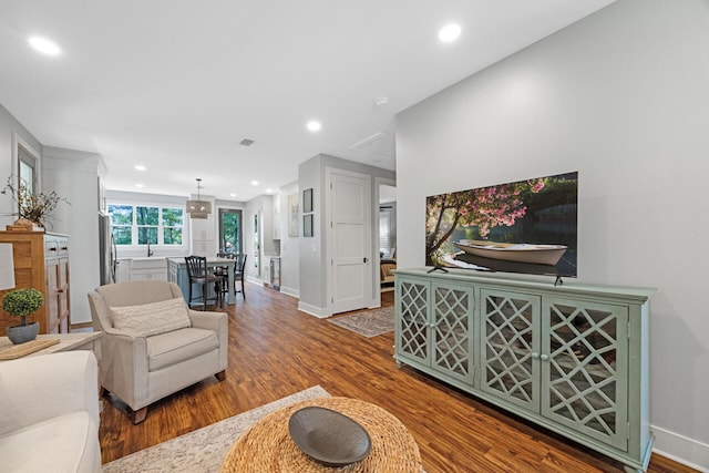 1650 Caswell Rd, Defuniak Springs, FL 32433 - living area featuring recessed lighting, wood finished floors, and baseboards