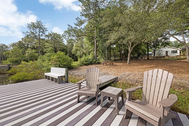 1650 Caswell Rd, Defuniak Springs, FL 32433 - deck featuring view of scattered trees