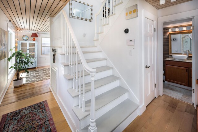 327 NE Yacht Club Dr, Fort Walton Beach, FL 32548 - stairs featuring wood finished floors and wood ceiling