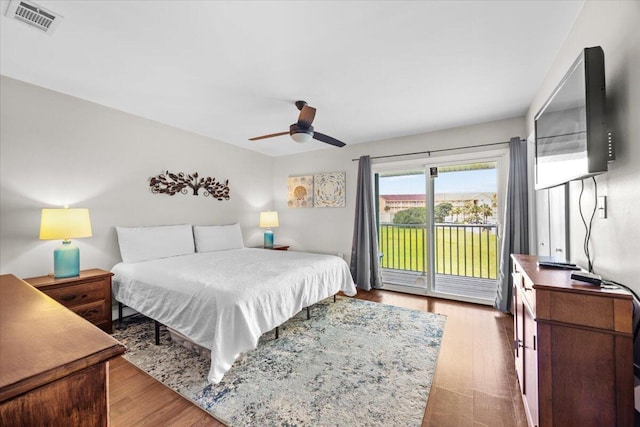 2000 Scenic Gulf Dr Unit 3, Miramar Beach, FL 32550 - bedroom with access to outside, ceiling fan, and wood finished floors