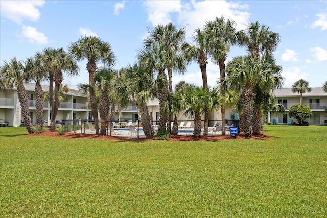 2000 Scenic Gulf Dr Unit 3, Miramar Beach, FL 32550 - view of home's community with a yard and a swimming pool