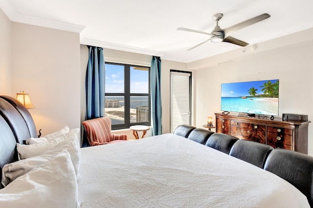 bedroom featuring crown molding and a ceiling fan