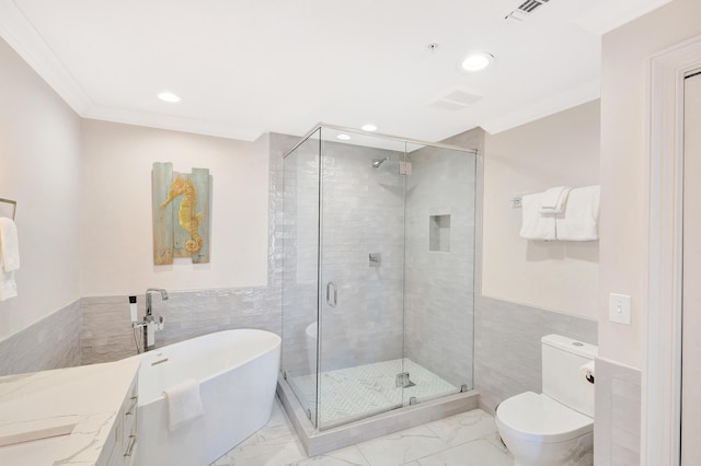 bathroom featuring tile walls, marble look tiles, recessed lighting, a stall shower, and toilet
