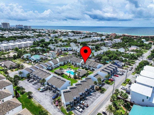 25 Misty Cv Unit 118, Miramar Beach, FL 32550 - drone / aerial view of a pool and a large body of water