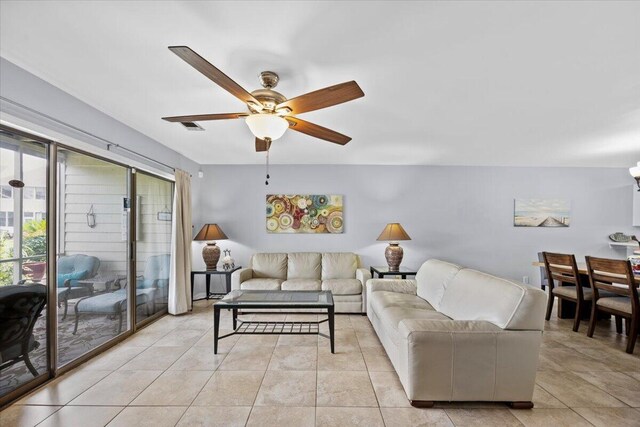 25 Misty Cv Unit 118, Miramar Beach, FL 32550 - living room with a ceiling fan and light tile patterned floors
