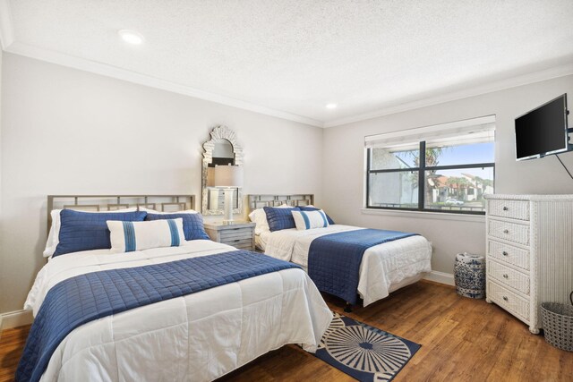 520 N Richard Jackson Blvd Unit 1510, Panama City Beach, FL 32407 - bedroom with ornamental molding, wood finished floors, baseboards, and recessed lighting
