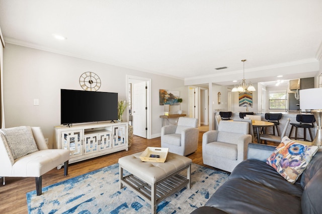 520 N Richard Jackson Blvd Unit 1510, Panama City Beach, FL 32407 - living room featuring wood finished floors, a chandelier, crown molding, baseboards, and recessed lighting