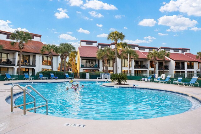 520 N Richard Jackson Blvd Unit 1510, Panama City Beach, FL 32407 - community pool with fence and a patio area