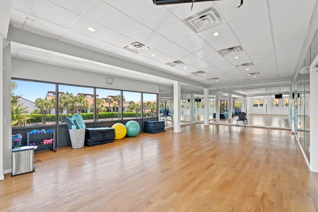 520 N Richard Jackson Blvd Unit 1510, Panama City Beach, FL 32407 - exercise room featuring a paneled ceiling and wood finished floors