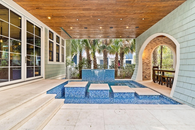 view of patio / terrace featuring french doors