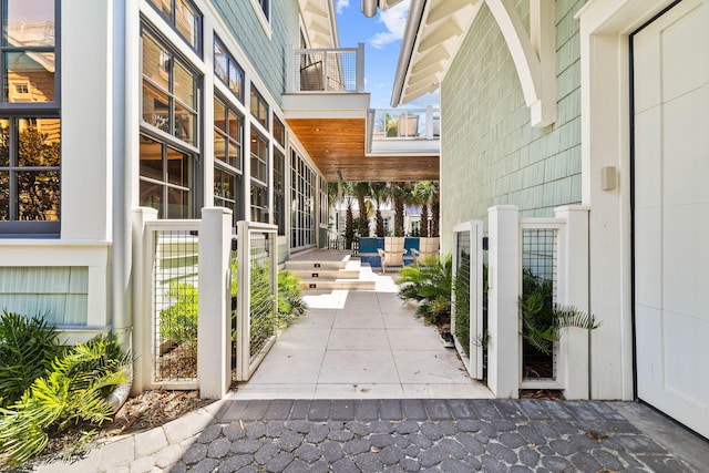 doorway to property featuring a balcony