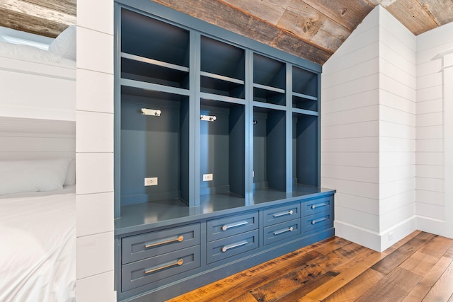 mudroom featuring dark wood-style flooring and wood ceiling