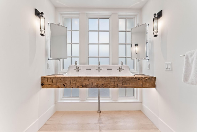 bathroom featuring baseboards