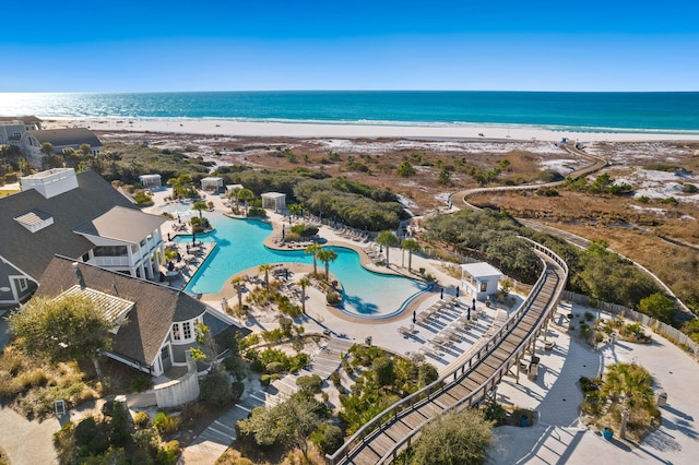 view of property location featuring expansive coastline and a pool area