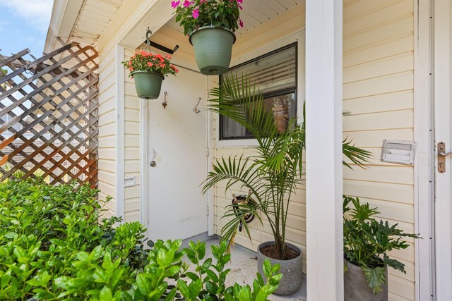 entrance to property with a porch