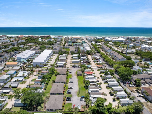aerial perspective of suburban area featuring a large body of water