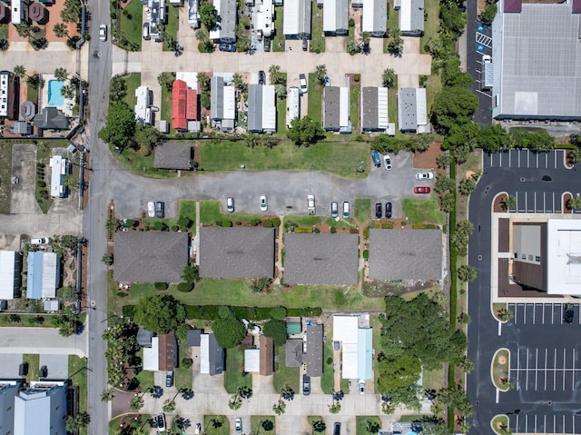 aerial view of property's location with nearby suburban area
