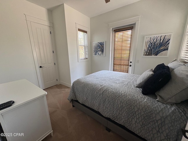 5303 Hopetown Ln, Panama City Beach, FL 32408 - carpeted bedroom with baseboards and access to exterior