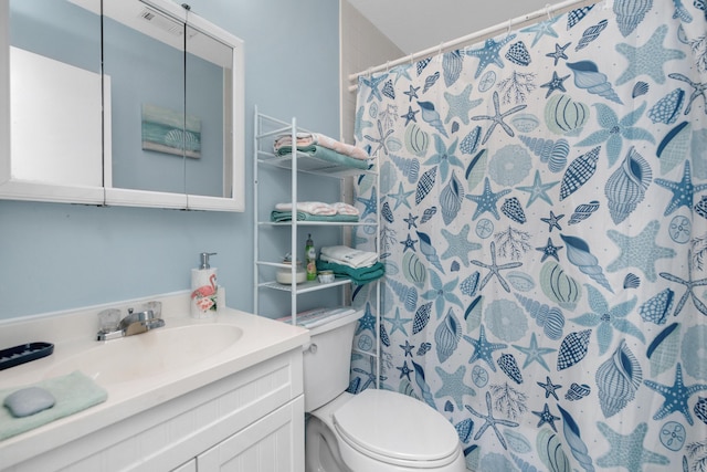 102 Wright Dr, Niceville, FL 32578 - full bathroom featuring toilet, vanity, and a shower with shower curtain
