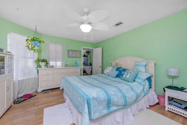 102 Wright Dr, Niceville, FL 32578 - bedroom featuring light wood finished floors and a ceiling fan