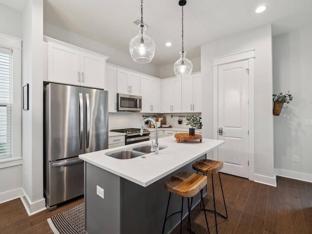 190 Valdare Ln, Inlet Beach, FL 32461 - kitchen with appliances with stainless steel finishes, a sink, baseboards, dark wood-style flooring, and recessed lighting