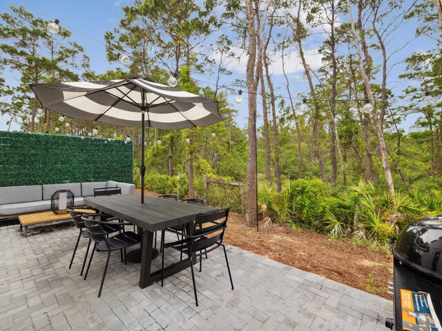 190 Valdare Ln, Inlet Beach, FL 32461 - view of patio / terrace with outdoor dining area, fence, and an outdoor hangout area