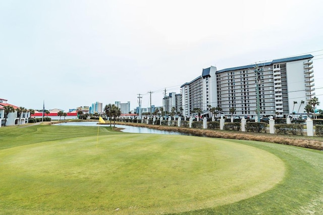 11347 Front Beach Rd # 601, Panama City Beach, FL 32407 - view of property's community with a water view, golf course view, and an area to practice putting