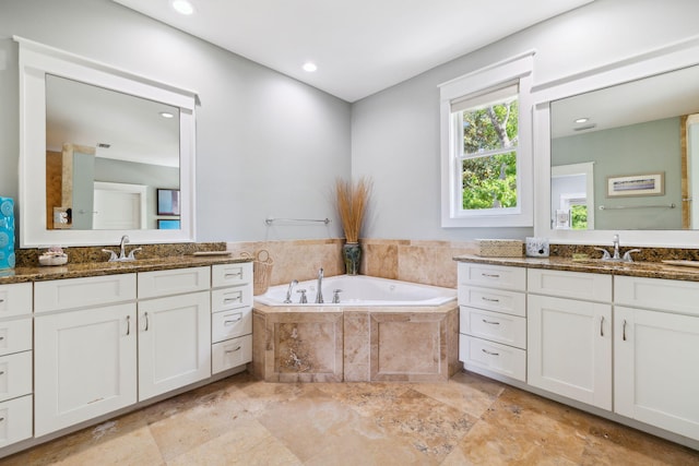 241 Overlook Dr, Miramar Beach, FL 32550 - full bath with a bath, two vanities, and recessed lighting