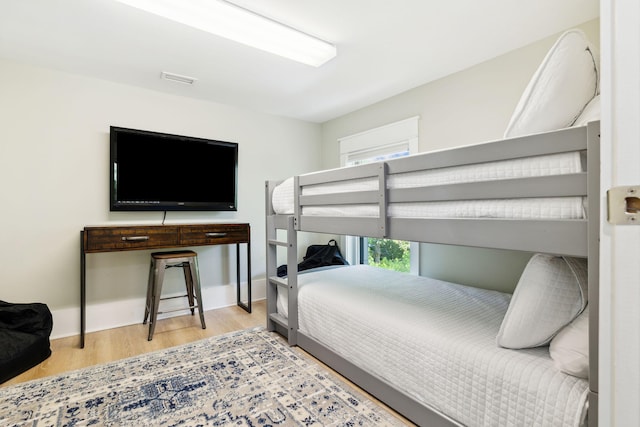 241 Overlook Dr, Miramar Beach, FL 32550 - bedroom featuring wood finished floors and baseboards