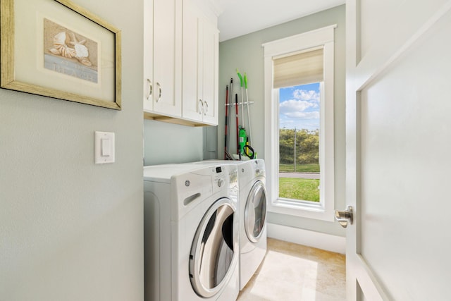 241 Overlook Dr, Miramar Beach, FL 32550 - washroom with separate washer and dryer, healthy amount of natural light, and cabinet space