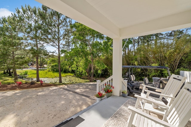 241 Overlook Dr, Miramar Beach, FL 32550 - view of patio featuring view of wooded area