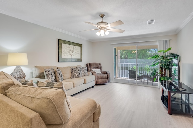 4274 Calinda Ln Unit 225, Niceville, FL 32578 - living room with wood finished floors, ornamental molding, and ceiling fan