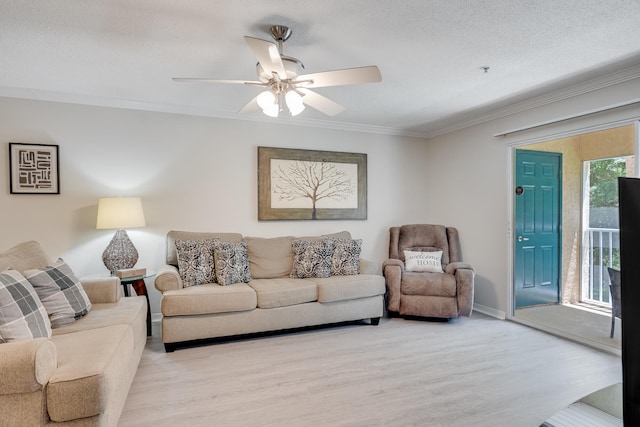 4274 Calinda Ln Unit 225, Niceville, FL 32578 - living room with crown molding, light wood-type flooring, and a ceiling fan