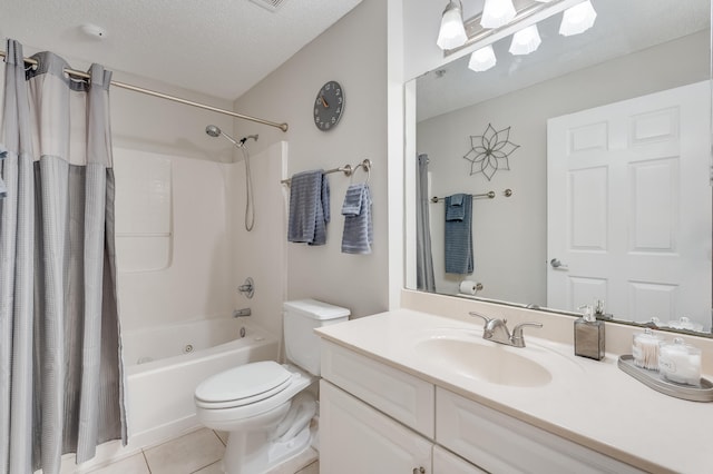 4274 Calinda Ln Unit 225, Niceville, FL 32578 - bathroom featuring tile patterned flooring, toilet, shower / tub combo, vanity, and a textured ceiling