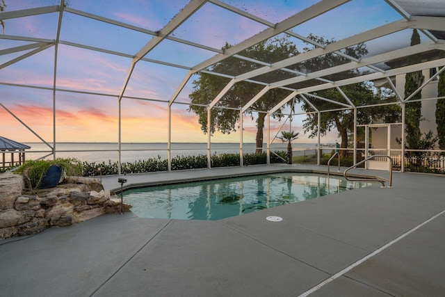 411 Calhoun Ave, Destin, FL 32541 - outdoor pool featuring a water view, a patio, and a lanai