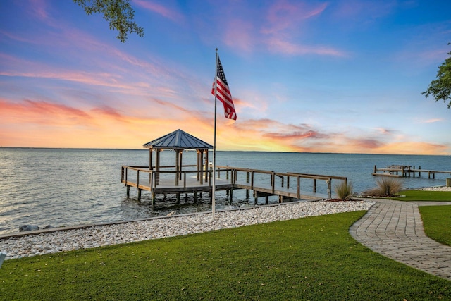 411 Calhoun Ave, Destin, FL 32541 - dock area with a water view and a yard