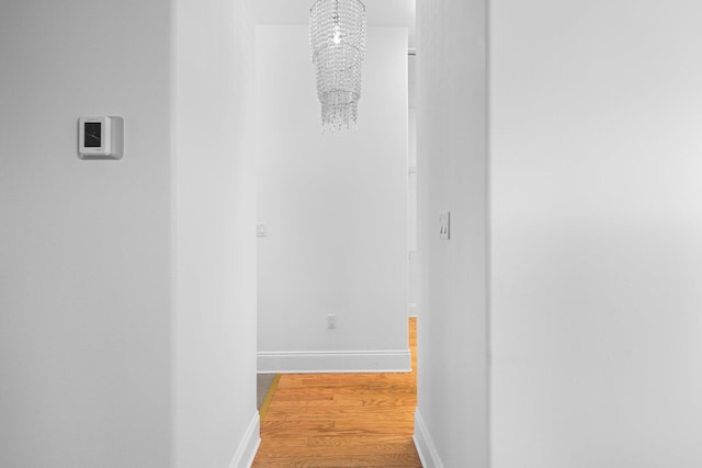 411 Calhoun Ave, Destin, FL 32541 - hallway with wood finished floors and baseboards