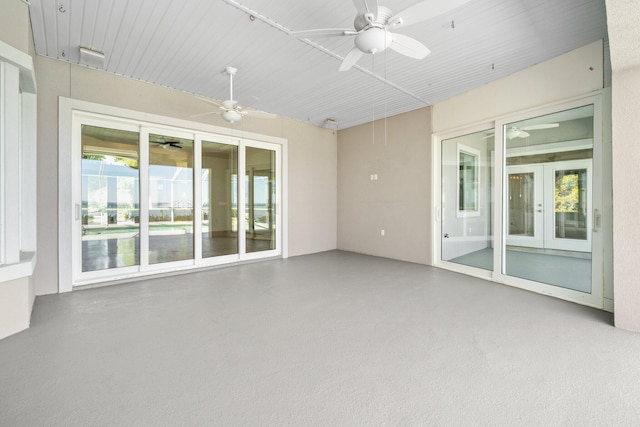 411 Calhoun Ave, Destin, FL 32541 - unfurnished sunroom featuring ceiling fan and french doors