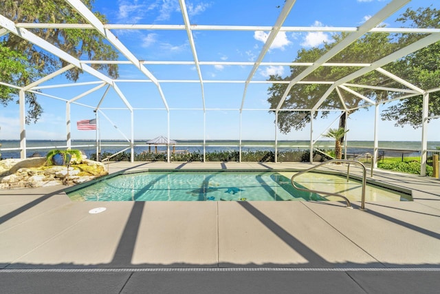 411 Calhoun Ave, Destin, FL 32541 - outdoor pool featuring a patio area, a water view, and glass enclosure