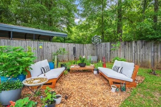5930 Wind Trace Rd, Crestview, FL 32536 - fenced backyard with outdoor lounge area