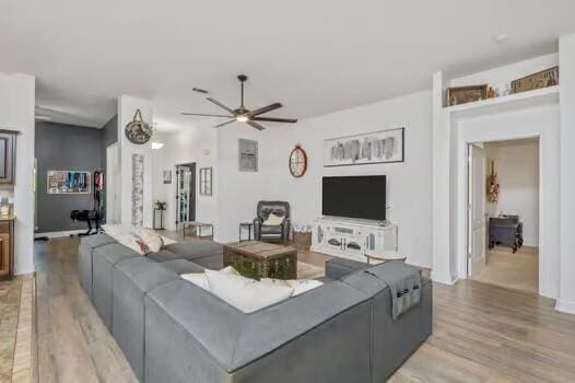 5930 Wind Trace Rd, Crestview, FL 32536 - living area featuring ceiling fan and light wood-type flooring
