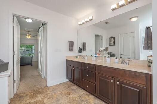 5930 Wind Trace Rd, Crestview, FL 32536 - full bathroom with ceiling fan and double vanity