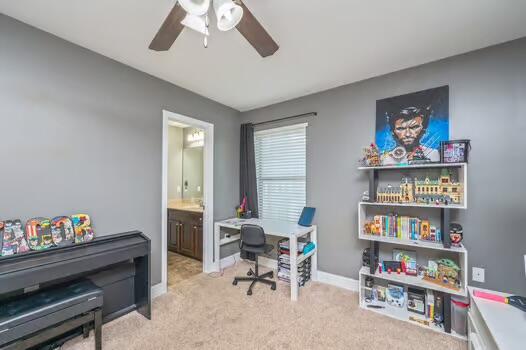 5930 Wind Trace Rd, Crestview, FL 32536 - office with ceiling fan, carpet flooring, and baseboards
