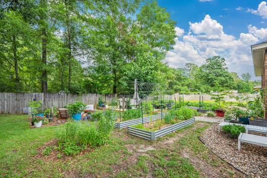5930 Wind Trace Rd, Crestview, FL 32536 - view of yard featuring a garden